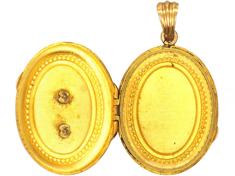 French 18ct Gold Oval Shaped Locket with a Flower Motif set with Natural Split Pearls
