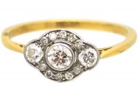 Art Deco 18ct Gold & Platinum Ring set with Three Diamonds with Smaller Diamonds Around Them