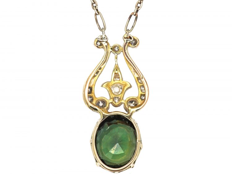 Edwardian Platinum Lyre Shaped Pendant on Chain set with a Green Sapphire & Diamonds