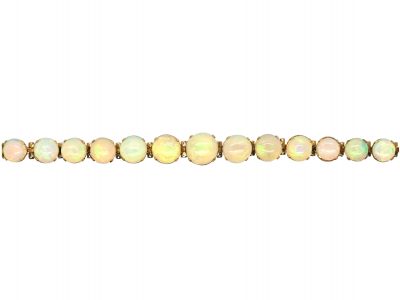 Retro 9ct Gold Bracelet set with a Line of Graduated Opals
