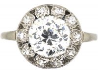 Portuguese Art Deco Platinum & Diamond Ring with Small Diamonds Around the Edge