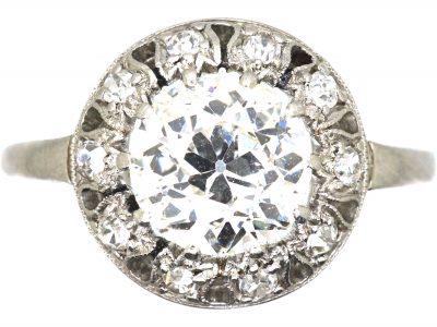 Portuguese Art Deco Platinum & Diamond Ring with Small Diamonds Around the Edge