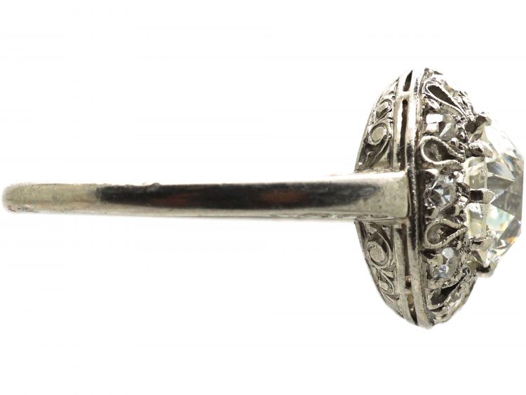 Portuguese Art Deco Platinum & Diamond Ring with Small Diamonds Around the Edge