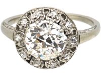 Portuguese Art Deco Platinum & Diamond Ring with Small Diamonds Around the Edge