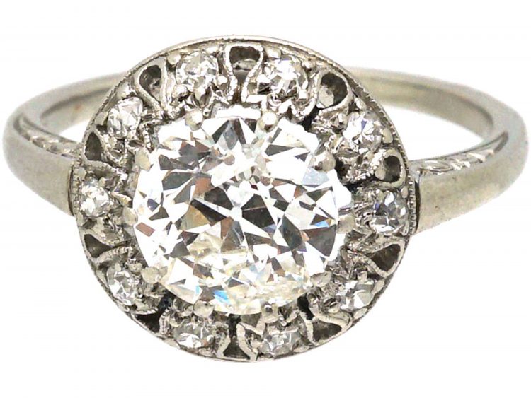Portuguese Art Deco Platinum & Diamond Ring with Small Diamonds Around the Edge