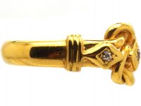 Edwardian 18ct Gold Lover's Knot Ring set with Three Diamonds