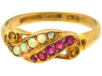 Edwardian 18ct Gold Crossover Ring set with Rubies & Opals