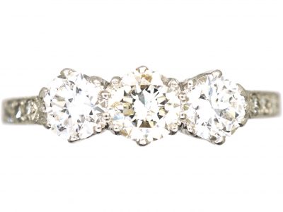 Art Deco Platinum, Three Stone Diamond Ring with Diamond Set Shoulders