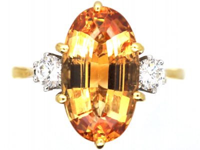 18ct Gold Ring set with a Topaz with Diamond Set Shoulders