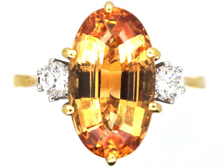 18ct Gold Ring set with a Topaz with Diamond Set Shoulders