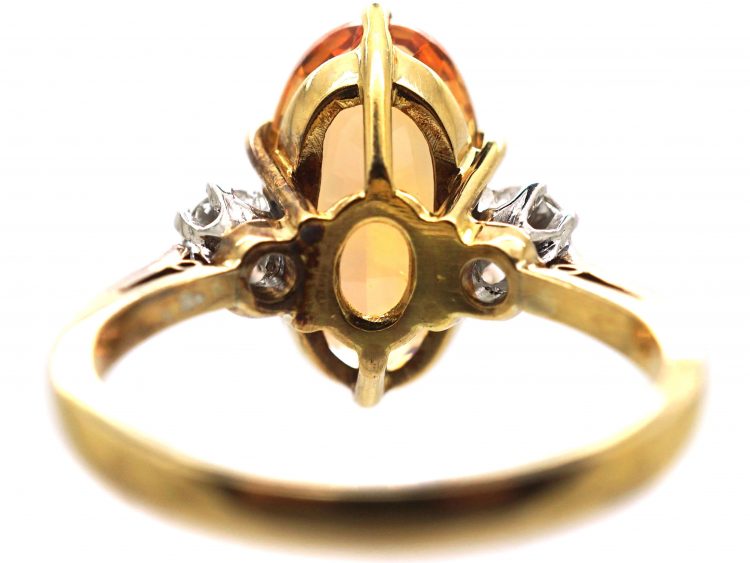 18ct Gold Ring set with a Topaz with Diamond Set Shoulders