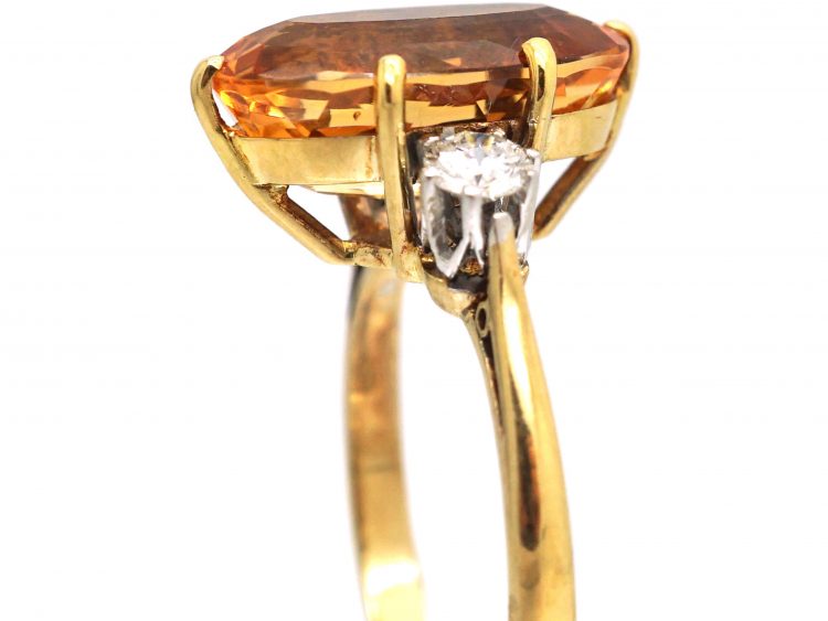 18ct Gold Ring set with a Topaz with Diamond Set Shoulders