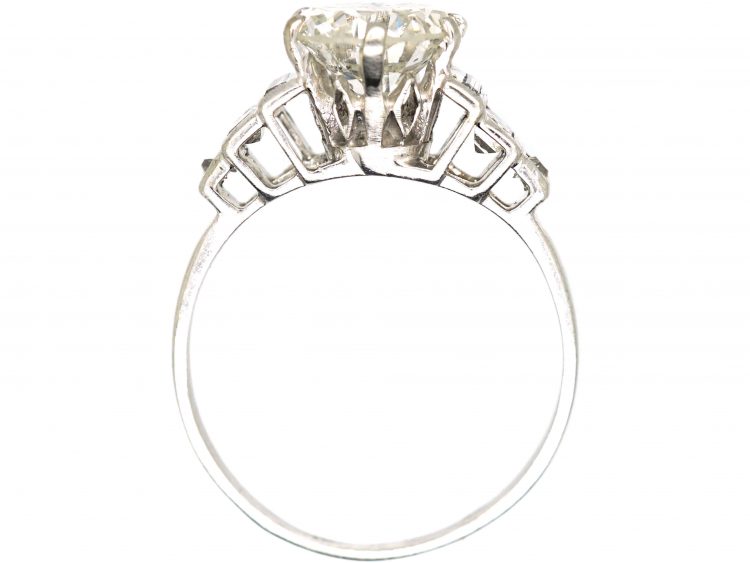 Art Deco Platinum Diamond Solitaire Ring with Step Cut Baguette Diamond Shoulders