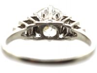 Art Deco Platinum Diamond Solitaire Ring with Step Cut Baguette Diamond Shoulders