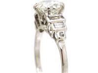 Art Deco Platinum Diamond Solitaire Ring with Step Cut Baguette Diamond Shoulders