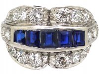 Art Deco Platinum Double Buckle Ring set with Calibre Sapphires & Diamonds