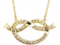 Edwardian Lover's Knot Pendant on Chain Set With Diamonds