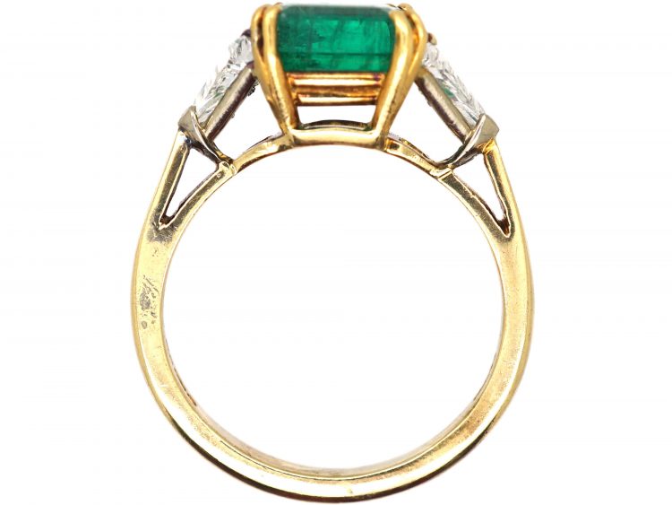 18ct Gold Ring set with an Emerald with a Triangular Cut Diamond on Either Side