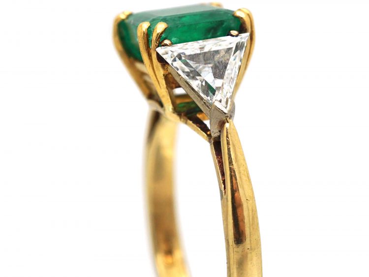 18ct Gold Ring set with an Emerald with a Triangular Cut Diamond on Either Side