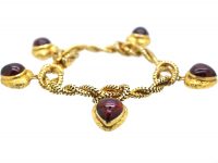 Early Victorian 18ct Gold Lover's Knot Bracelet with Five Hearts set with Cabochon Garnets