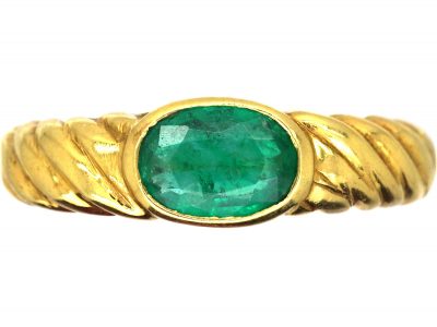 18ct Gold Coily Ring set with an Emerald