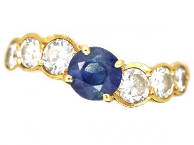 Modernist 18ct Gold Curved Ring set with a Sapphire & Diamonds