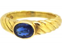18ct Gold Modernist Coil Design Ring set with a Sapphire