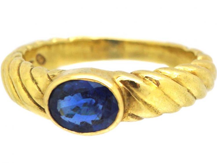 18ct Gold Modernist Coil Design Ring set with a Sapphire