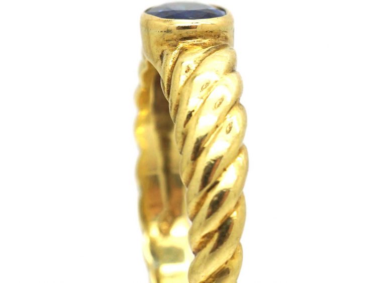 18ct Gold Modernist Coil Design Ring set with a Sapphire