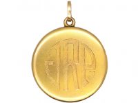 Early 20th Century Round Locket set with a Sapphire & Diamonds