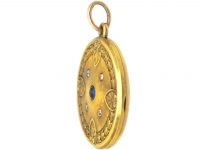 Early 20th Century Round Locket set with a Sapphire & Diamonds