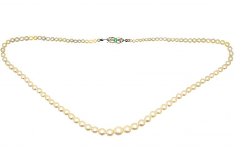 Early 20th Century Graduated Cultured Pearl Necklace with an 18ct White Gold, Emerald & Diamond Clasp