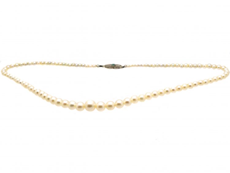 Early 20th Century Graduated Cultured Pearl Necklace with an 18ct White Gold, Emerald & Diamond Clasp