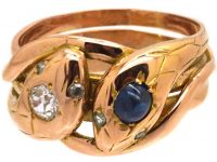 Late 19th Century Double Snake Ring set with a Diamond and a Cabochon Sapphire