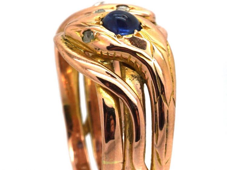 Late 19th Century Double Snake Ring set with a Diamond and a Cabochon Sapphire