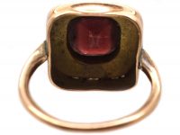 Edwardian 9ct Gold Ring set with a Garnet surrounded with Natural Split Pearls