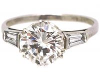 Art Deco Platinum 2.27 Carat Diamond Solitaire Ring with Tapered Baguette Diamond Shoulders