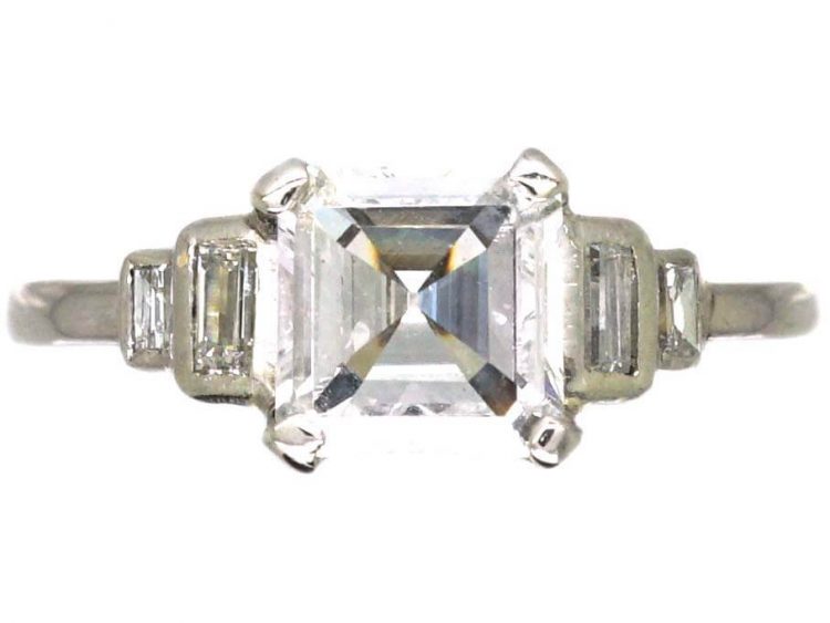 Art Deco Platinum Ring set with an Asscher Cut Diamond with Step Cut Shoulders set with Baguette Cut Diamonds