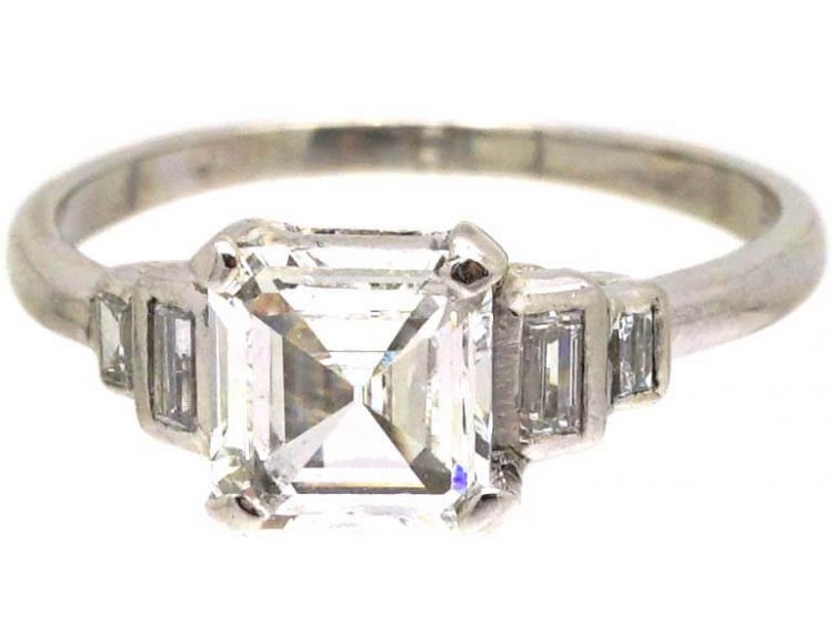 Art Deco Platinum Ring set with an Asscher Cut Diamond with Step Cut Shoulders set with Baguette Cut Diamonds