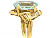1950s 18ct Gold Ring set with an Aquamarine & Small Diamonds
