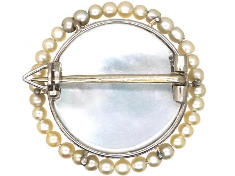 Edwardian Carved Moonstone Man in the Moon Brooch with a Border of Natural Pearls & Diamonds