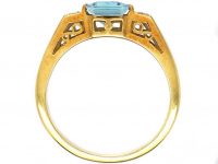 18ct Gold Ring set with a Rectangular Cut Aquamarine with Diamonds on Either Side