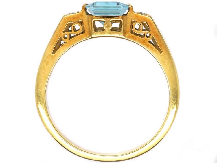 18ct Gold Ring set with a Rectangular Cut Aquamarine with Diamonds on Either Side
