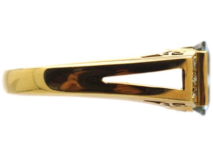 18ct Gold Ring set with a Rectangular Cut Aquamarine with Diamonds on Either Side