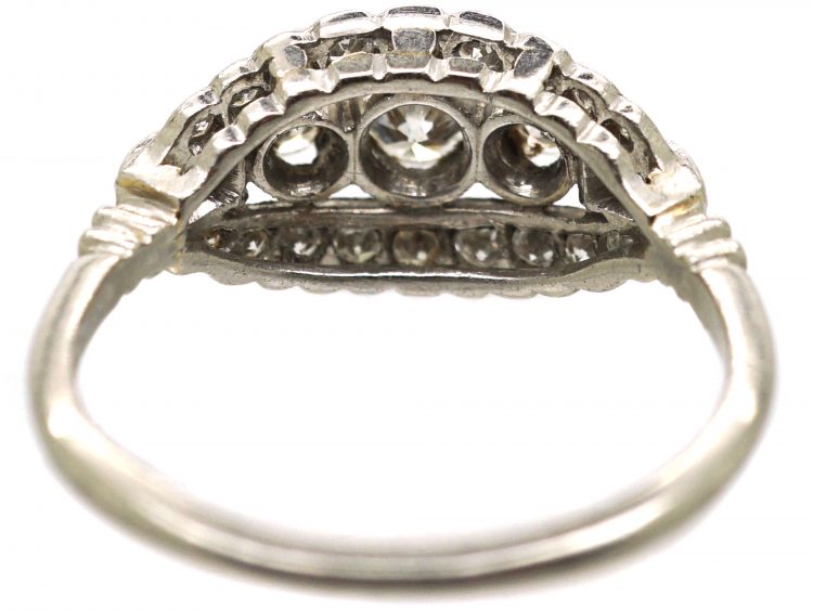 Early 20th Century Platinum, Three Stone Diamond Cluster Ring by Alabaster & Wilson
