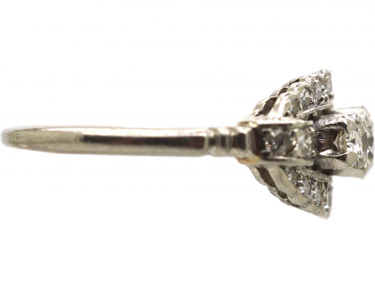 Early 20th Century Platinum, Three Stone Diamond Cluster Ring by Alabaster & Wilson