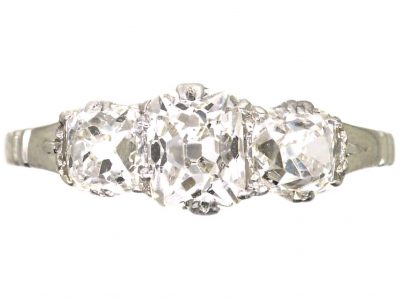 Early 20th Century Platinum, Old Mine Cut Three Stone Diamond Ring