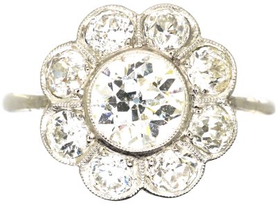 Early 20th Century Platinum, Diamond Daisy Cluster Ring
