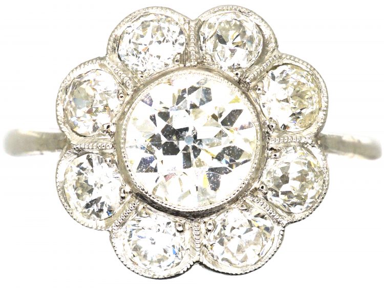 Early 20th Century Platinum, Diamond Daisy Cluster Ring