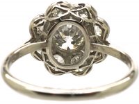 Early 20th Century Platinum, Diamond Daisy Cluster Ring